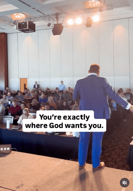 Back view of Ed on stage